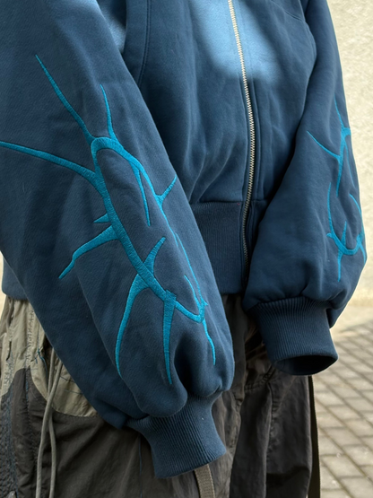 blue spikey-zip