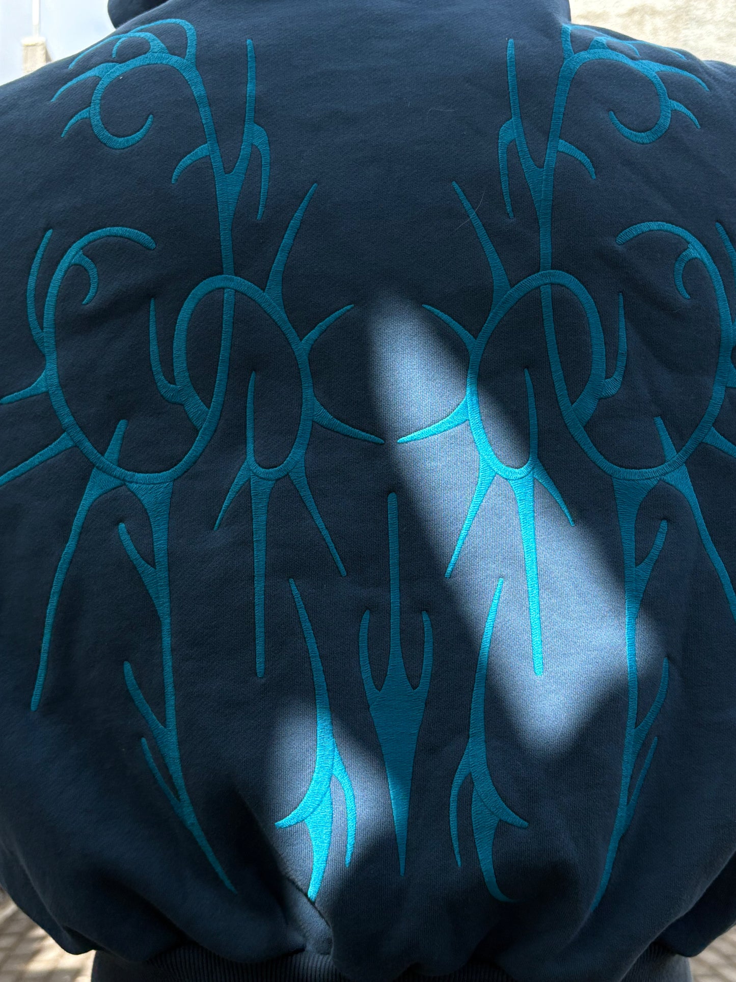 blue spikey-zip