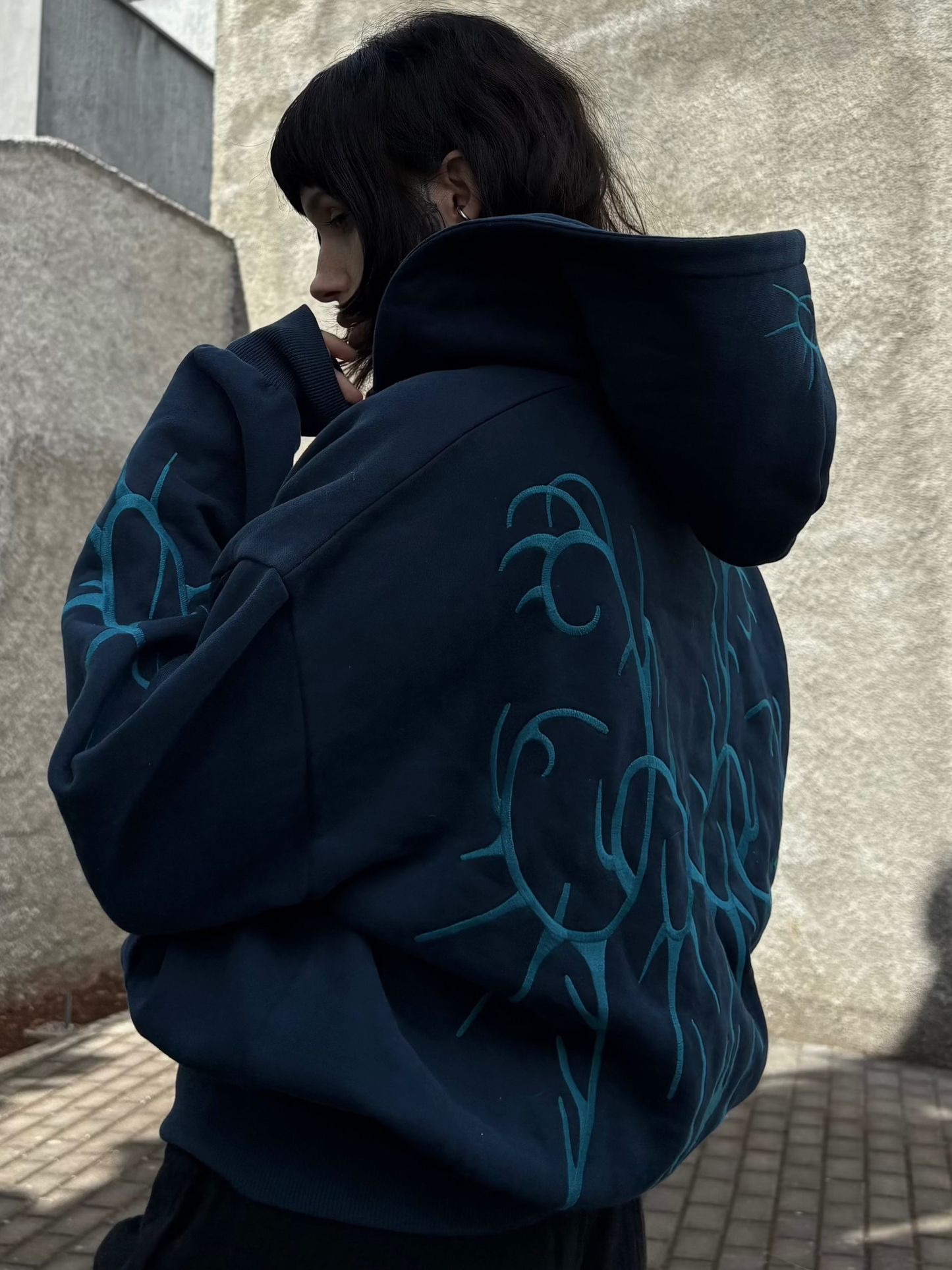 blue spikey-zip